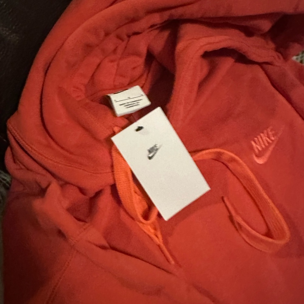 Stay cozy and stylish with the brand-new Nike Hoodie!